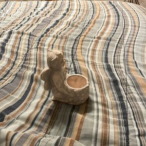 New with tags yard ornament has an angel on it the year is from 2003